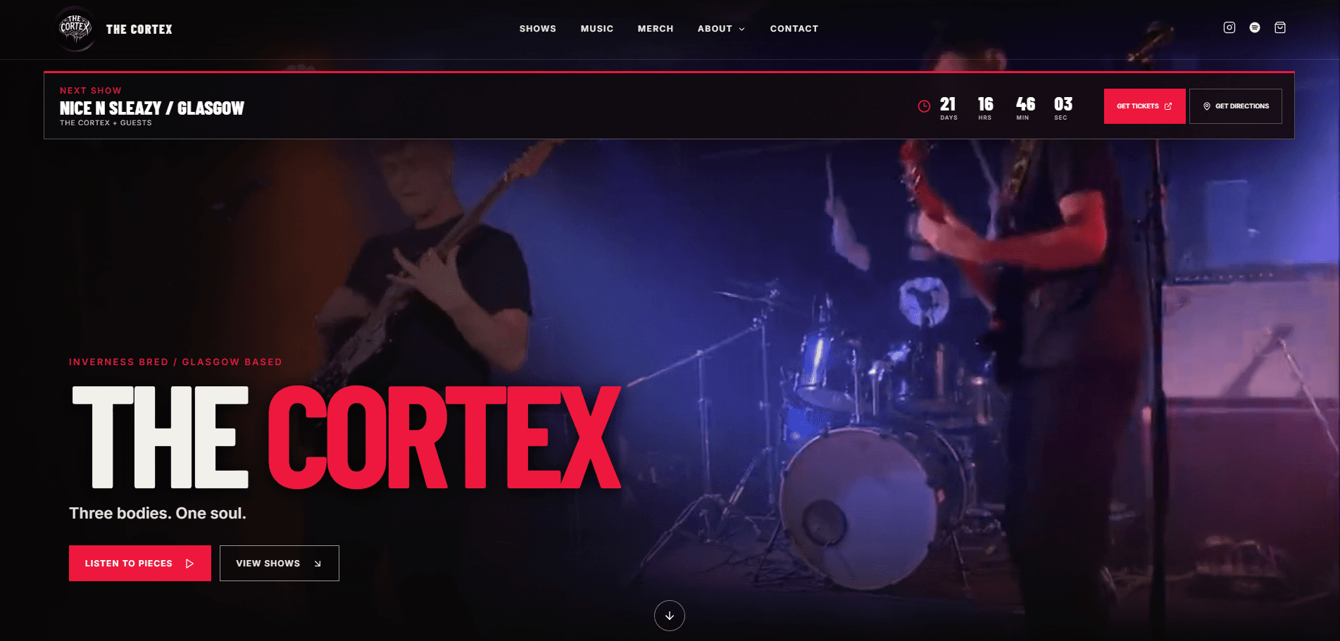 The Cortex website hero with the band performing live.